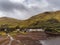 Leenaun, Ireland - 07/16/2020: Aerial view on Leenaun hotel by Kilary fjord. Cloudy sky. Part of Wild Atlantic Way route