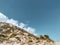 Lefkada cliffs with trees and bright blue sky