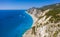 Lefkada, Greece. Remote white Egremni beach with lonely luxury yacht boat on the turquoise colored bay on Ionian Sea