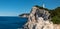 Lefkada island sea coast lighthouse on rocky cliff