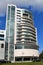 The left tower of the Varna Towers - modern business, shopping and entertainment center on a sunny day against a blue sky with cl