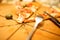 Leftover slices of pizza on a natural wooden plate, shallow depth of field