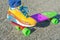 Leg skateboarder on a colorful skateboard.