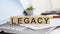 LEGACY Wooden cubes with letters on a laptop keyboard