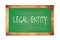 LEGAL  ENTITY text written on green school board