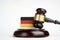 Legal law concept image, judge gavel and flag of Germany