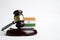 Legal law concept image, judge gavel and flag of India