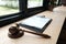 legal law gavel & notebook on wood table. lawyer attorney justice workplace