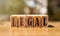 LEGAL word written on wood block. legal text on table, concept