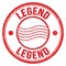 LEGEND text written on red round postal stamp sign