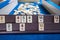 Legendary game okey and game table. Turkish board game Okey Rummikub. A table with green cloth and chips. Hands of the players