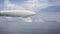 Legendary huge zeppelin airship on sky with clouds. Stylized flying balloon.