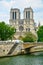 Legendary Paris cathedral Notre Dame. Beautiful Parisian achitecture. Magnificent landmark after destructive fire.