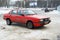 Legendary vintage Audi 80 parked in winter street of Smolensk.