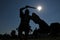 Legionary with gladius sword, helmet and shield combats in silhouette during Tempora in Aquileia, ancient Roman re-enactment