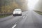 Legionowo, Poland - October 24, 2021: Fog on the road. Autumn weather and difficult road conditions. Limited visibility on the