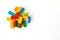 Lego backround. Multicolor Plastick constructor bricks on white background. Popular toys. Copyspace