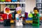 Lego Hidden Side set. Three Lego minifigures - Jack Davids, J.B. and Douglas Elton in J.B.â€™s Ghost Lab