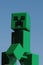 Lego Minecraft figure of Creeper green monster mob, walking forward