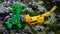 LEGO Minecraft large action figure of Creeper creature chased by Minecraft ocelot cat on frozen moss.