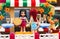 Lego Pizzeria. Waitress serves pizza for guests in restaurant