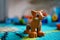 Lego plastic dog figurine on a floor