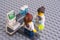 Lego scientists near laboratory computer