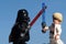 Lego Star Wars figures of Luke Skywalker and Darth Vader fighting with lightsabers