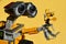 LEGO Wall-E robot model is holding LEGO Minecraft beekeeper figure with bee and golden shovel