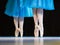 Legs of ballerinas dancing in ballet