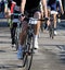 Legs of cyclists pedaling  during the road cycling race