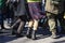 Legs of dancing youth in the street during Saint Patrick s day parade. Friends enjoying and having fun on St.Patrick`s
