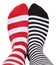 Legs in different striped socks.