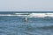 Legs of diving man in the swim flippers above the storm waves