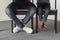 Legs of father and son under table