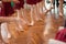 Legs and feet of group of young ballerina girls on parquet in russian dance school indoors