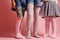 Legs of girls in childrens colorful tights