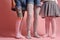 Legs of girls in childrens colorful tights