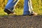 Legs hiker boots shoes woman walking country road