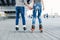 legs loving couple in jeans and rollerblading. ride on the rolle