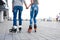 legs loving couple in jeans and rollerblading. ride on the rolle