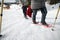 Legs of People while snowshoeing in the mountains