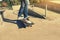 legs practice skateboarding at skatepark