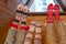 Legs of restful family of father, mother and little daughter in Christmas socks