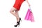 Legs of shopping lady showing shopping bag