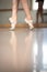 Legs and slippers of classical ballet dancers