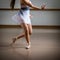 Legs and slippers of classical ballet dancers