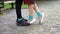 Legs of teens in modern comfortable sneakers, standing on tiptoes, sport shoes