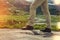 Legs traveler close-up on a background of mountain landscape