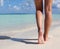 Legs on Tropical Sand Beach. Walking Female Feet.